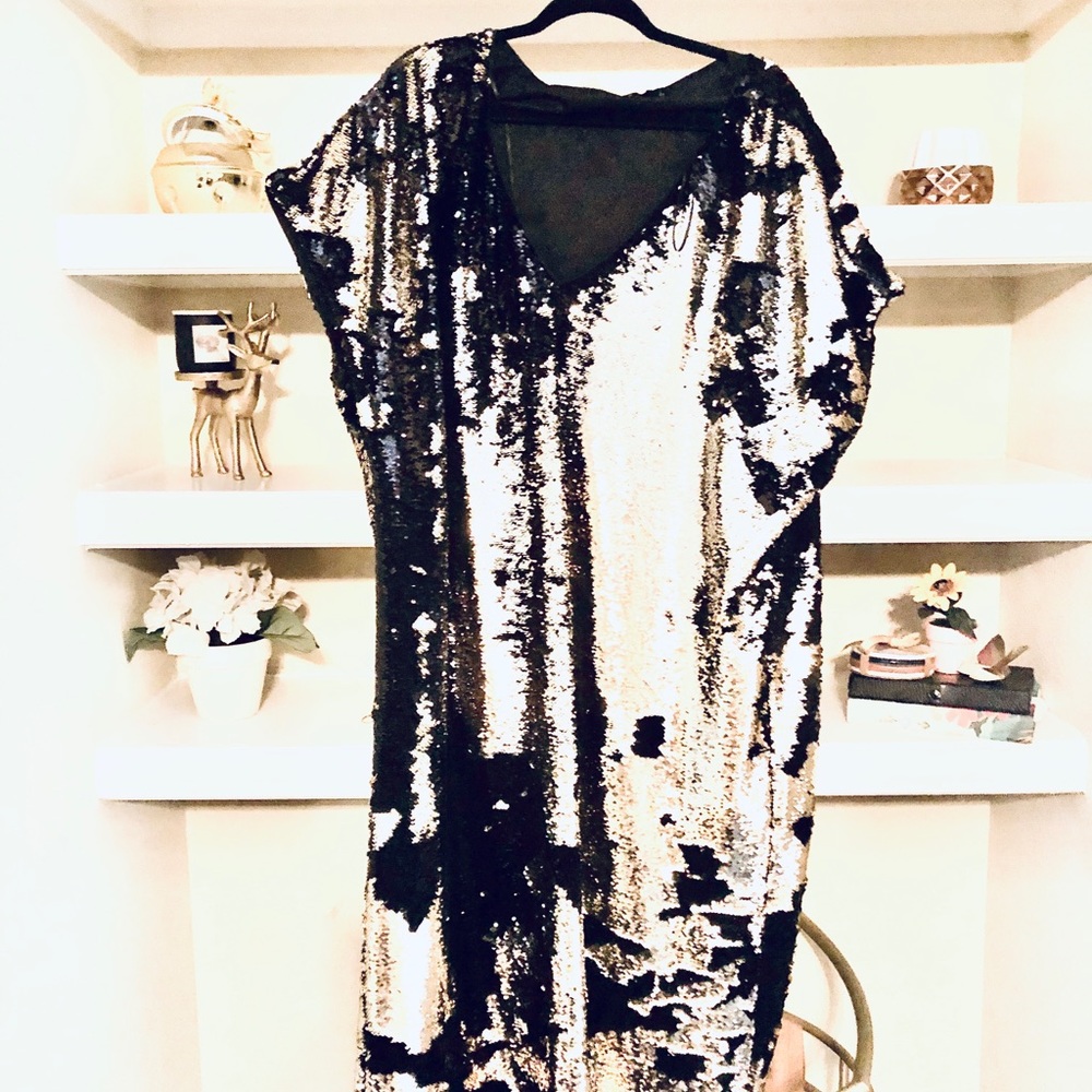 Black and gold sequin dress